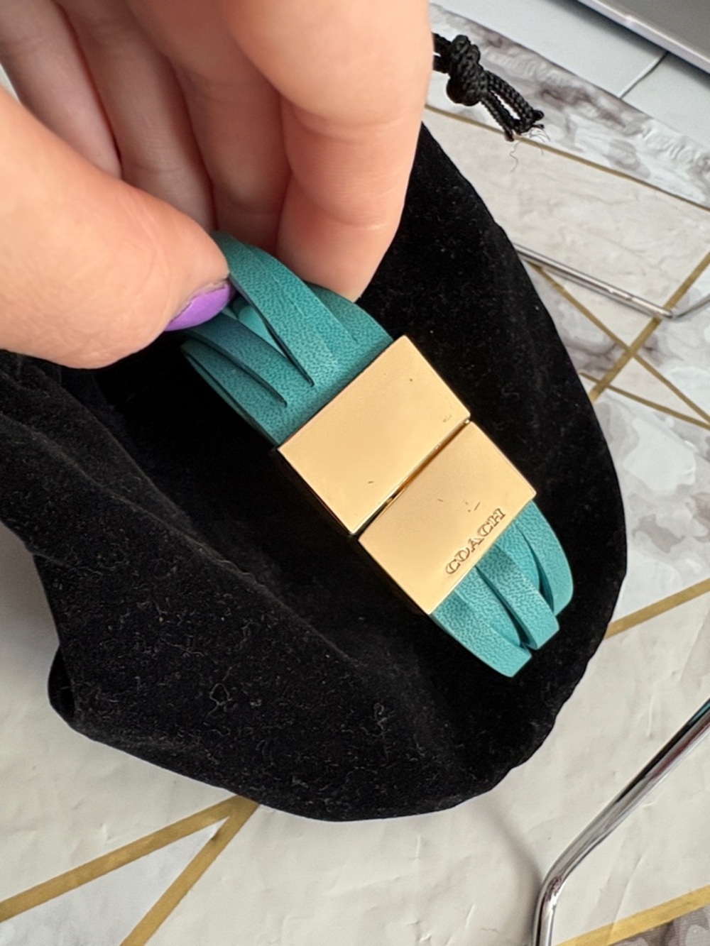 Coach Teal Strap and Gold Hardware Bracelet with Mini Velvet Bucket Bag